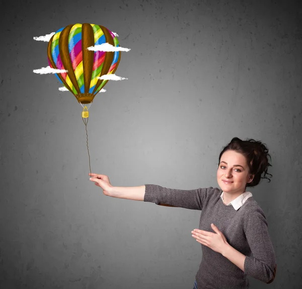 Mulher segurando um desenho de balão — Fotografia de Stock