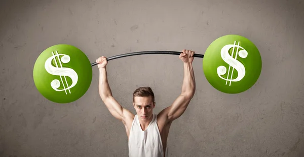 Muscular man lifting green dollar sign weights — Stock Photo, Image