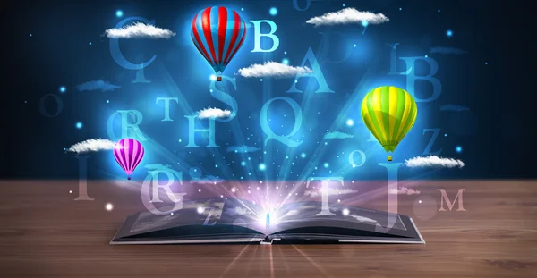 Open boek met gloeiende fantasie abstracte wolken en ballonnen — Stockfoto