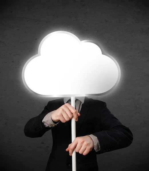 Businessman holding a cloud — Stock Photo, Image