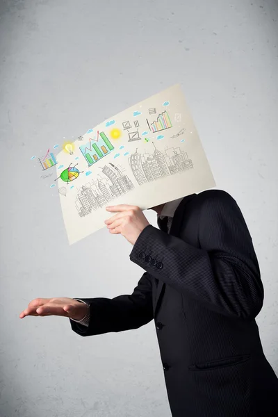 Businessman holding a paper with charts and cityscape in front o — Stock Photo, Image