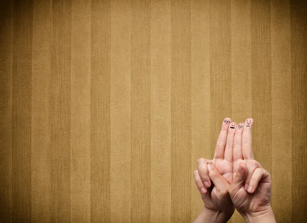 Happy finger smileys with vintage stripe wallpaper background — Stock Photo, Image