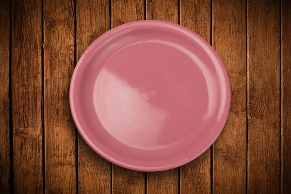 Assiette vide colorée sur table de fond grungy — Photo