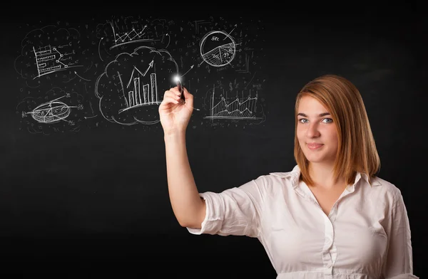 Young lady sketching financial chart icons and symbols — Stock Photo, Image