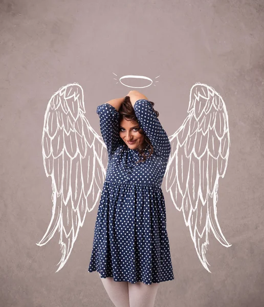 Cute girl with angel illustrated wings — Stock Photo, Image