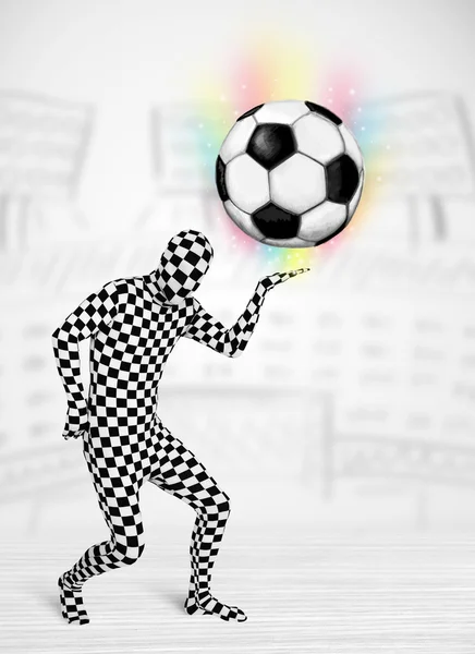 Man in full body suit holdig soccer ball — Stock Photo, Image