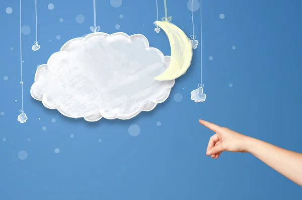 Ruka ukazuje na kreslené noční mraky s měsícem — Stock fotografie