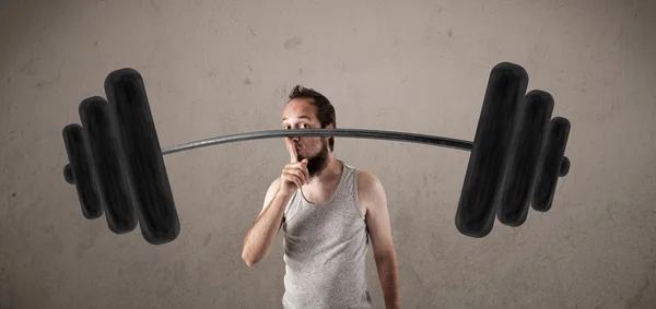 Funny skinny guy lifting weights — Stock Photo, Image