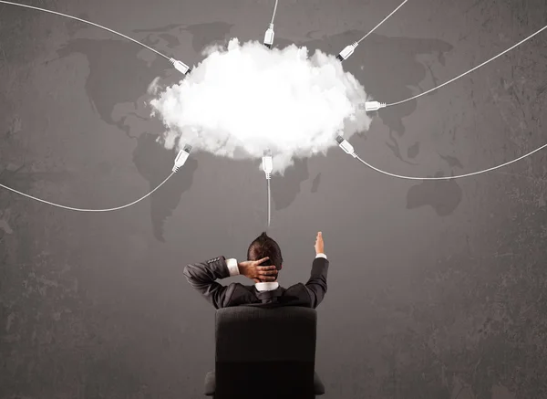 Young man looking at cloud transfer world service — Stock Photo, Image