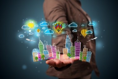 Renkli elleri olan genç bir kadın Metropolitan Şehri 'ni çiziyor.