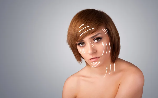 Beautiful girl with facial arrows on her skin — Stock Photo, Image