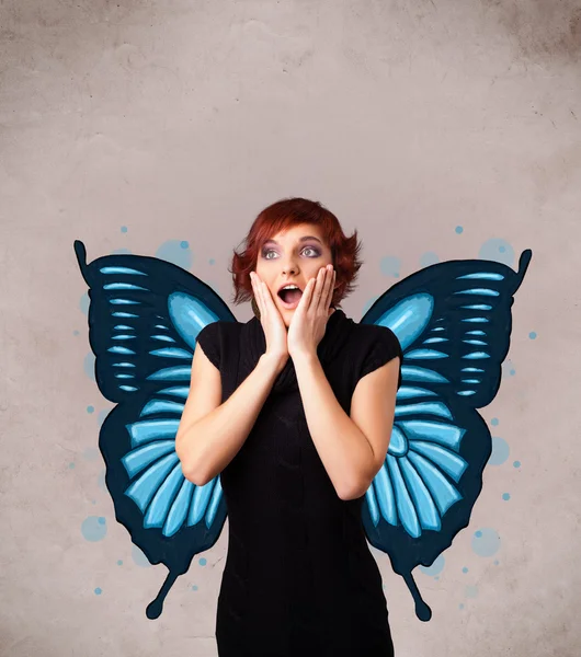 Young girl with butterfly blue illustration on the back — Stock Photo, Image