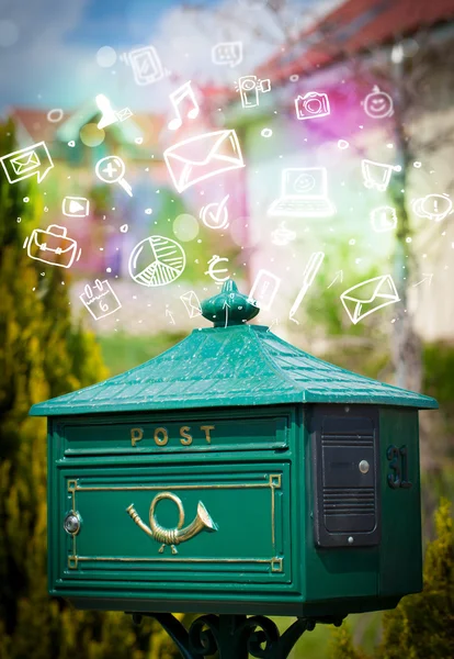 Colorful icons and symbols bursting out of a mailbox — Stock Photo, Image