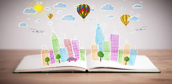 Cityscape drawing on open book — Stock Photo, Image