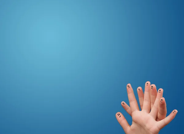 Alegre sonriente cara dedos mirando vacío azul fondo copia —  Fotos de Stock