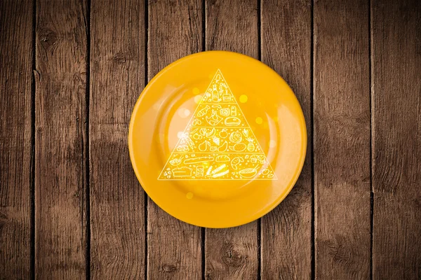カラフルな皿の上に手描きの食品ピラミッド — ストック写真