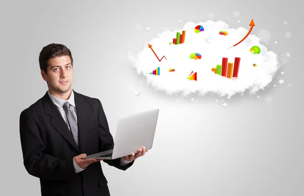 Young man presenting cloud with graphs and charts — Stock Photo, Image