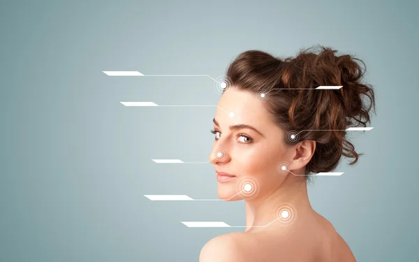 Young sexy girl with facial treatment modern arrows — Stock Photo, Image