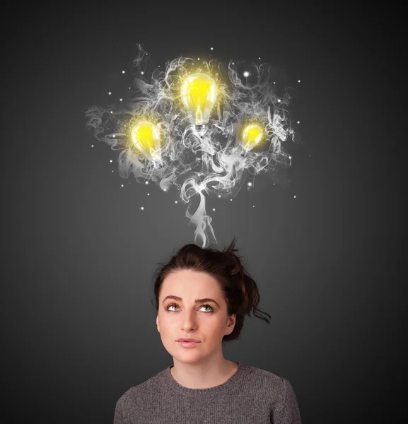 Thoughtful woman with smoke and lightbulbs above her head — Stock Photo, Image