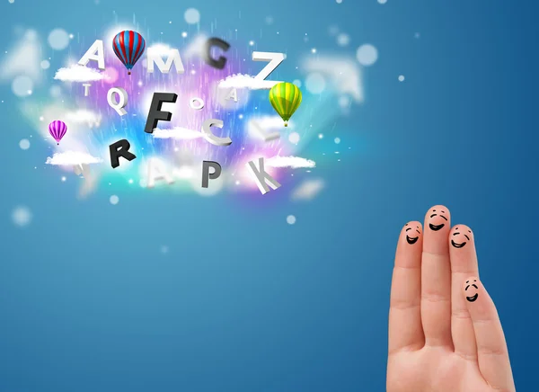 Happy smiley fingers looking at colorful magical clouds and ball — Stock Photo, Image