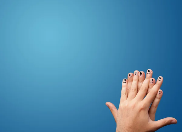 Alegre sonriente cara dedos mirando vacío azul fondo copia —  Fotos de Stock