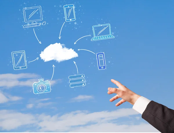 Hand syftar på cloud computing concept på blå himmel — Stockfoto