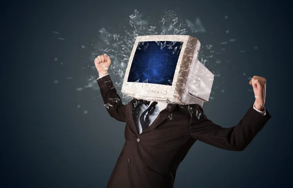 Computer monitor screen exploding on a young persons head — Stock Photo, Image