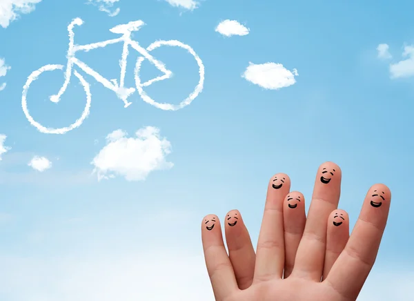 Happy smiley fingers looking at a bicycle shapeed cloud — Stock Photo, Image