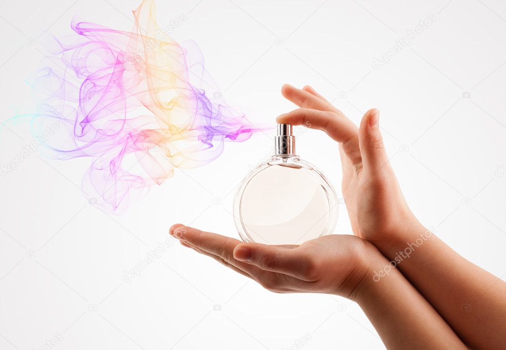 Woman hands spraying perfume — Stock Photo © ra2studio #47895241