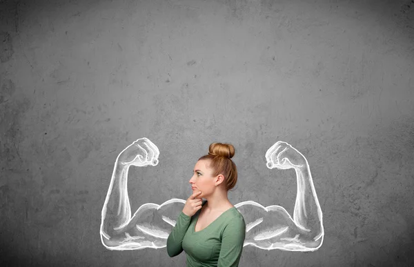 Jovem com braços musculados fortes — Fotografia de Stock