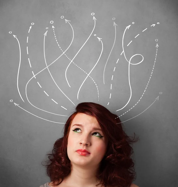 Young woman with arrows coming out of her head — Stock Photo, Image