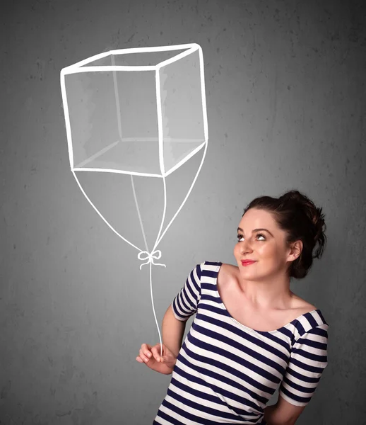 Женщина держит кубический шар — стоковое фото