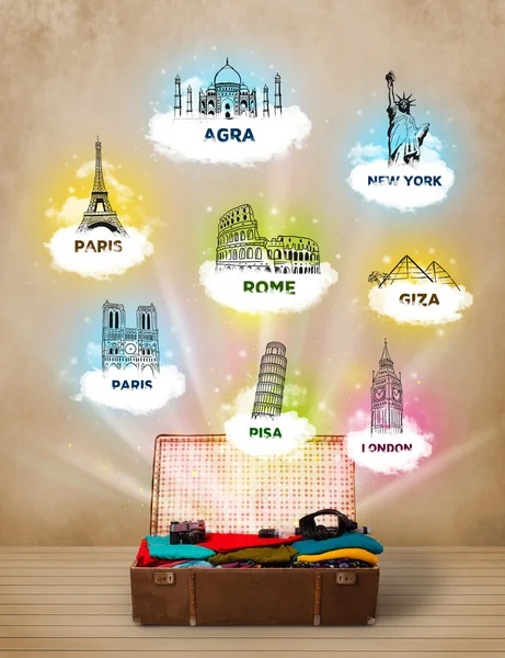 Toeristische koffer met beroemde bezienswaardigheden over de hele wereld — Stockfoto