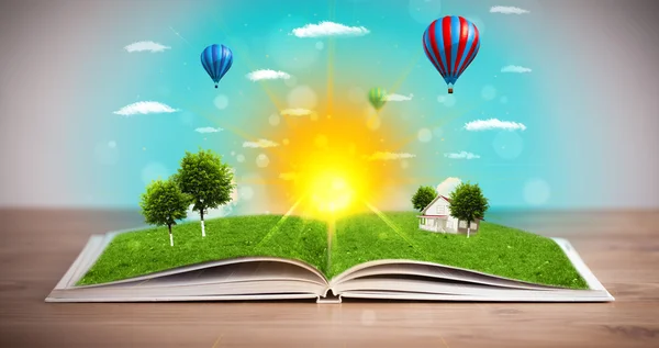Open book with green nature world coming out of its pages — Stock Photo, Image