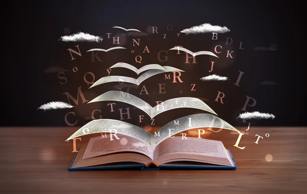 Pages and glowing letters flying out of a book — Stock Photo, Image