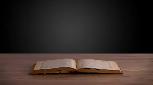 Open book on wooden deck — Stock Photo, Image