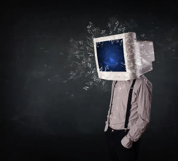 Computer monitor screen exploding on a young persons head — Stock Photo, Image