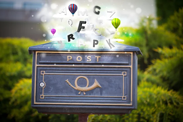 Post box with colorful letters — Stock Photo, Image