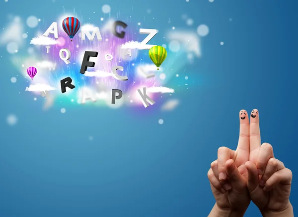Happy smiley fingers looking at colorful magical clouds and ball — Stock Photo, Image