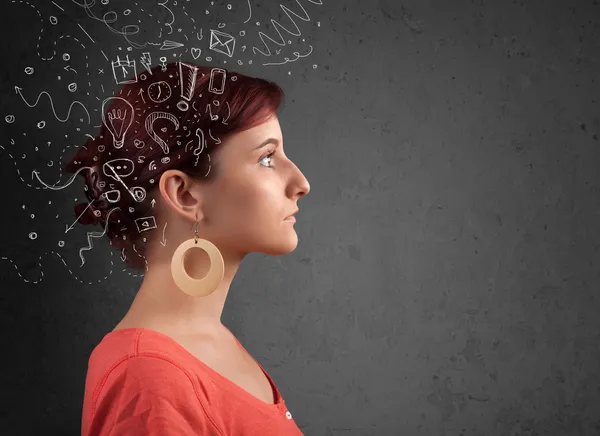 Menina pensando com ícones abstratos na cabeça — Fotografia de Stock