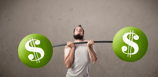 Skinny guy lifting green dollar sign weights — Stock Photo, Image