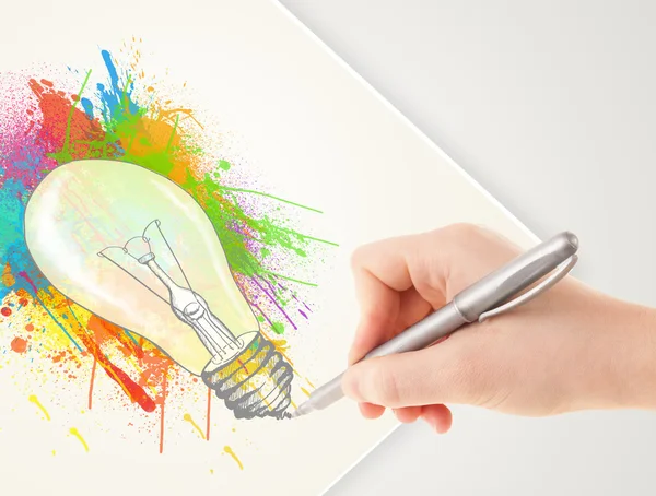 Hand drawing colorful idea light bulb with a pen — Stock Photo, Image