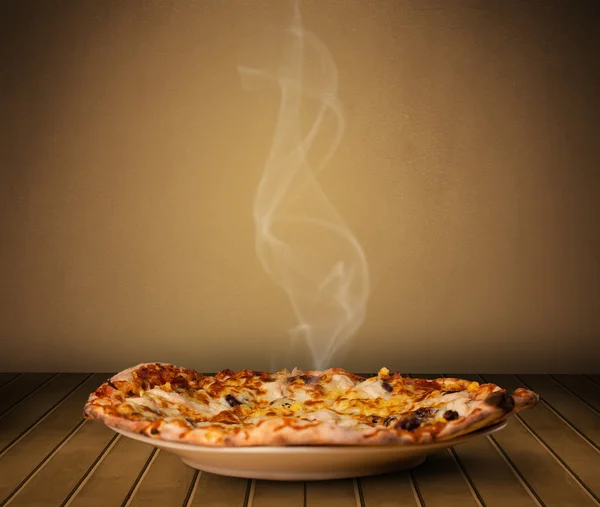 Fresh delicious home cooked pizza with steam — Stock Photo, Image