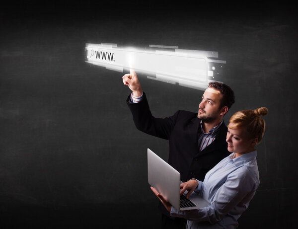 Young business couple touching web browser address bar with www 