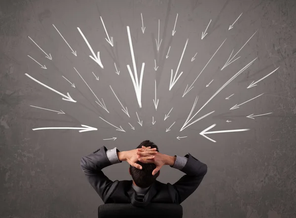 Business man with hand drawn arrows pointing at his head — Stock Photo, Image