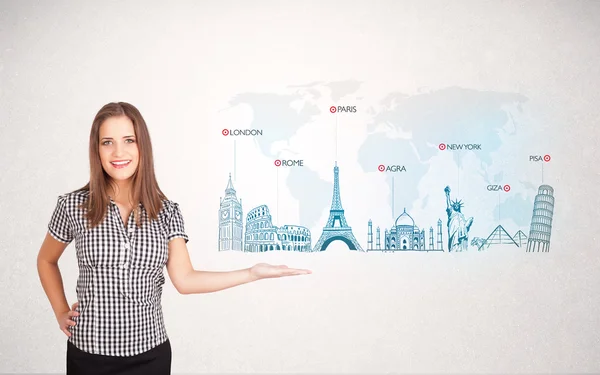 Business woman presenting map with famous cities and landmarks — Stock Photo, Image