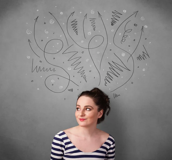 Young woman thinking with arrows over her head — Stock Photo, Image