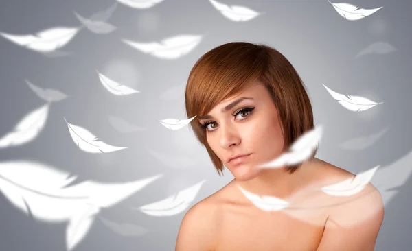 Beautifull young girl with light feather skin concept — Stock Photo, Image