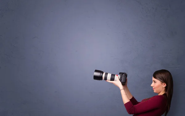 Photographer shooting images with copyspace area — Stock Photo, Image