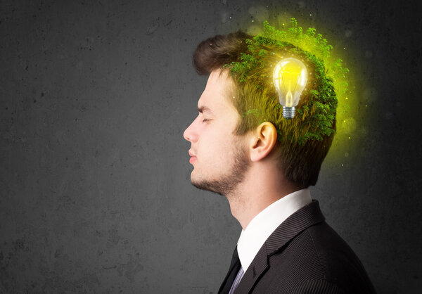 Young mind thinking of green eco energy with lightbulb